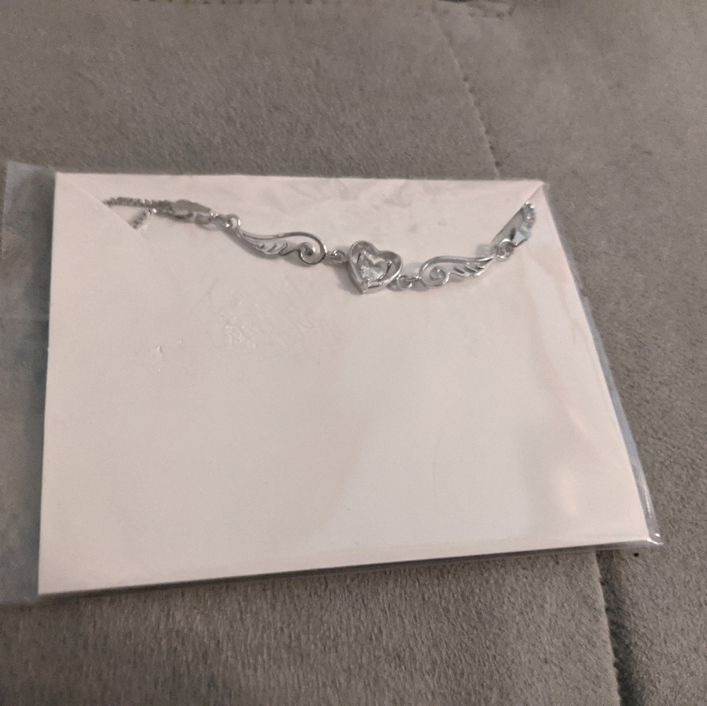 Dainty silver necklace with flower